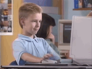 80s kid typing on a school computer, from kokoro kids blog